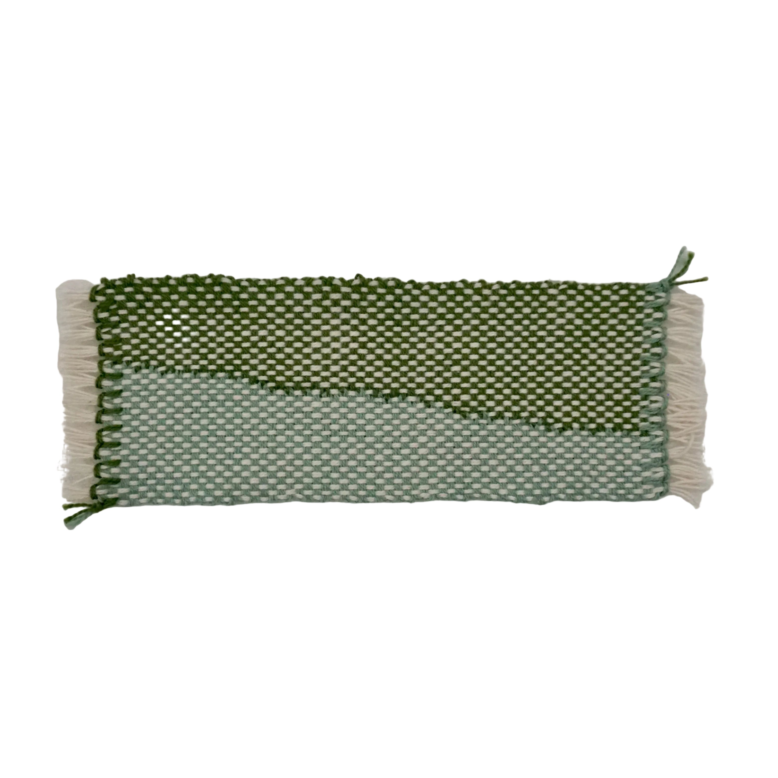 A blue, green, and white woven bookmark with a diagonal design on a white background.