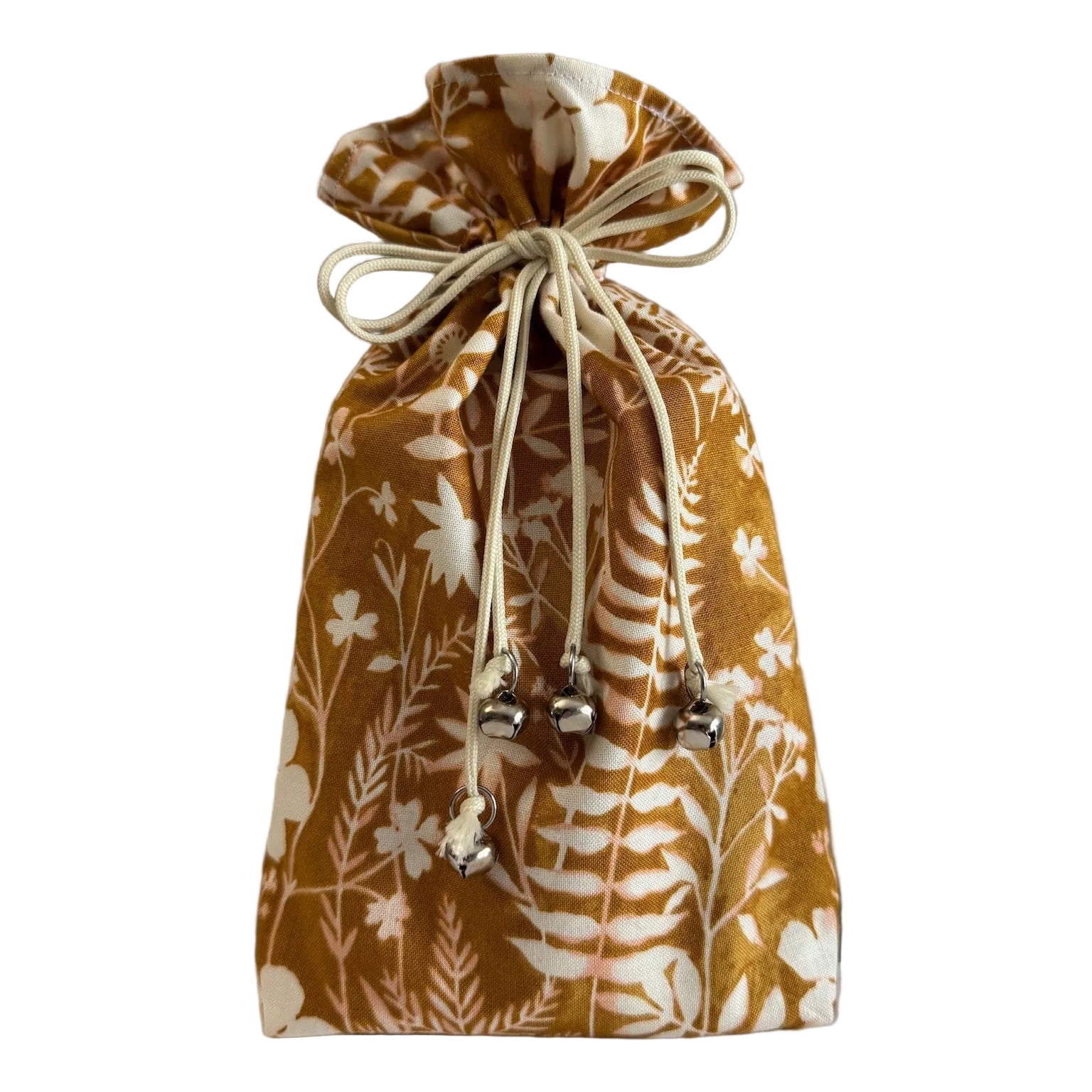 Drawstring bag with rusty orange floral fern pattern on a white background