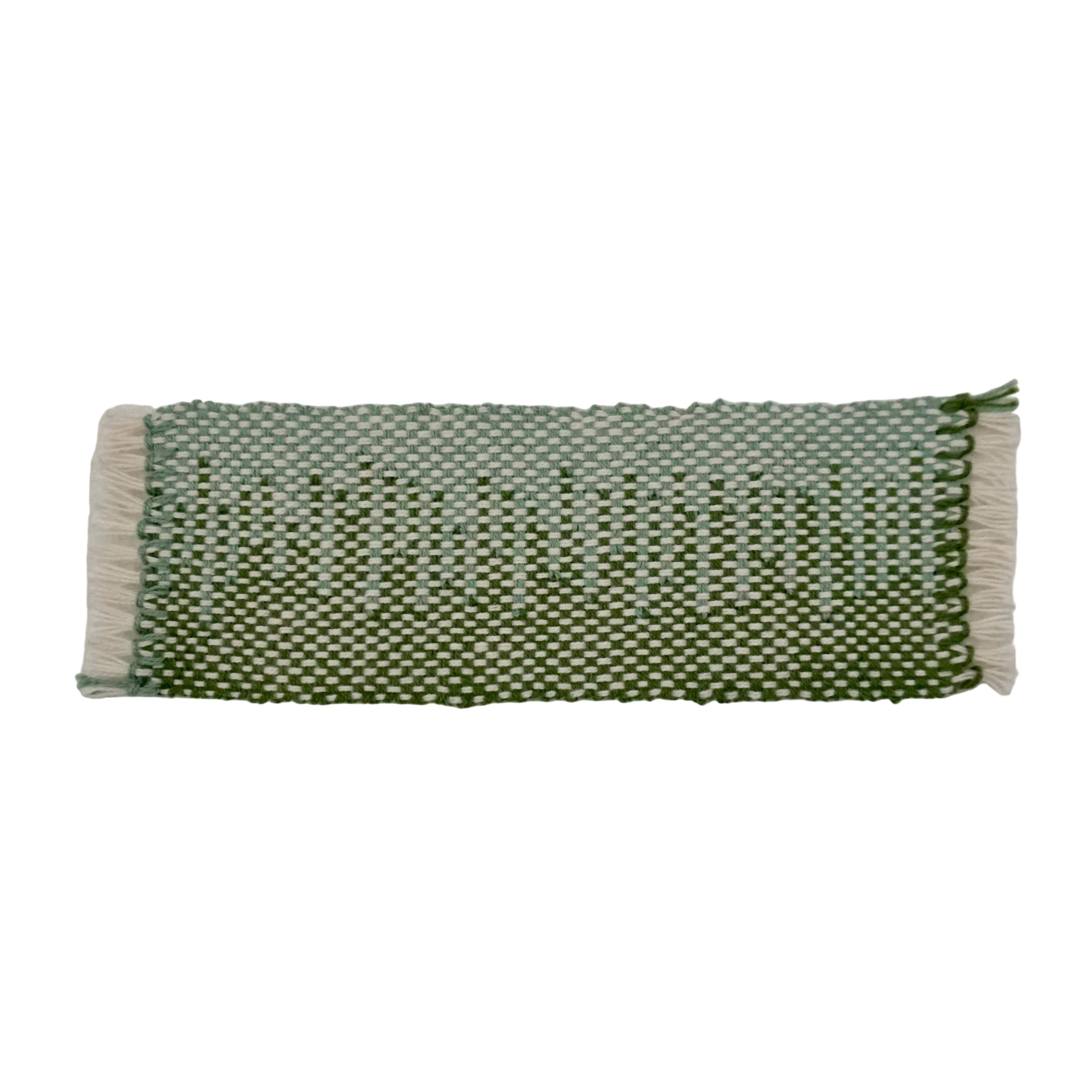 A blue, green, and white bookmark with a clasped weft pattern on a white background.