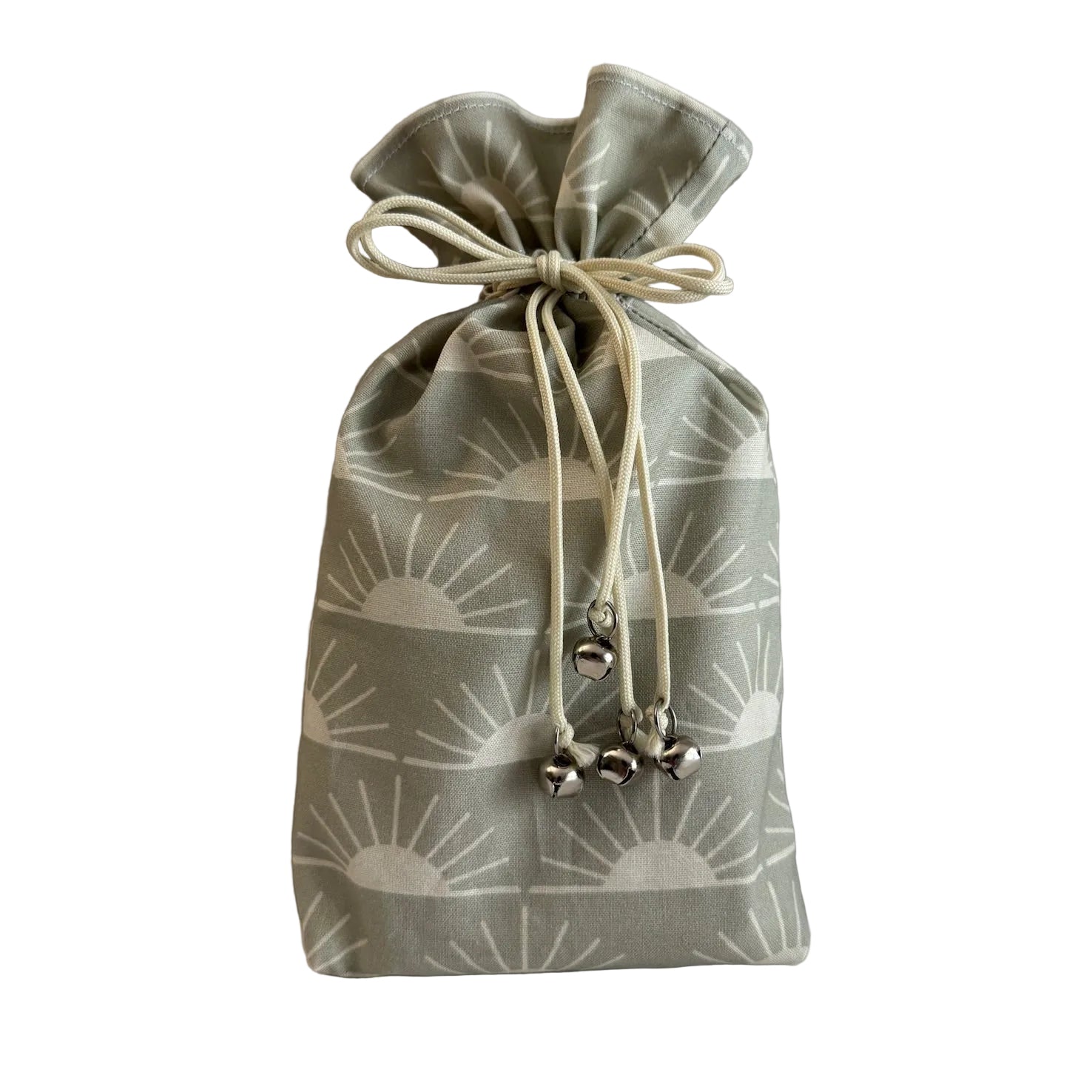 Fabric drawstring bag with a sage colored sun pattern on a white background