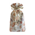Fabric drawstring bag with seashell pattern on a white background
