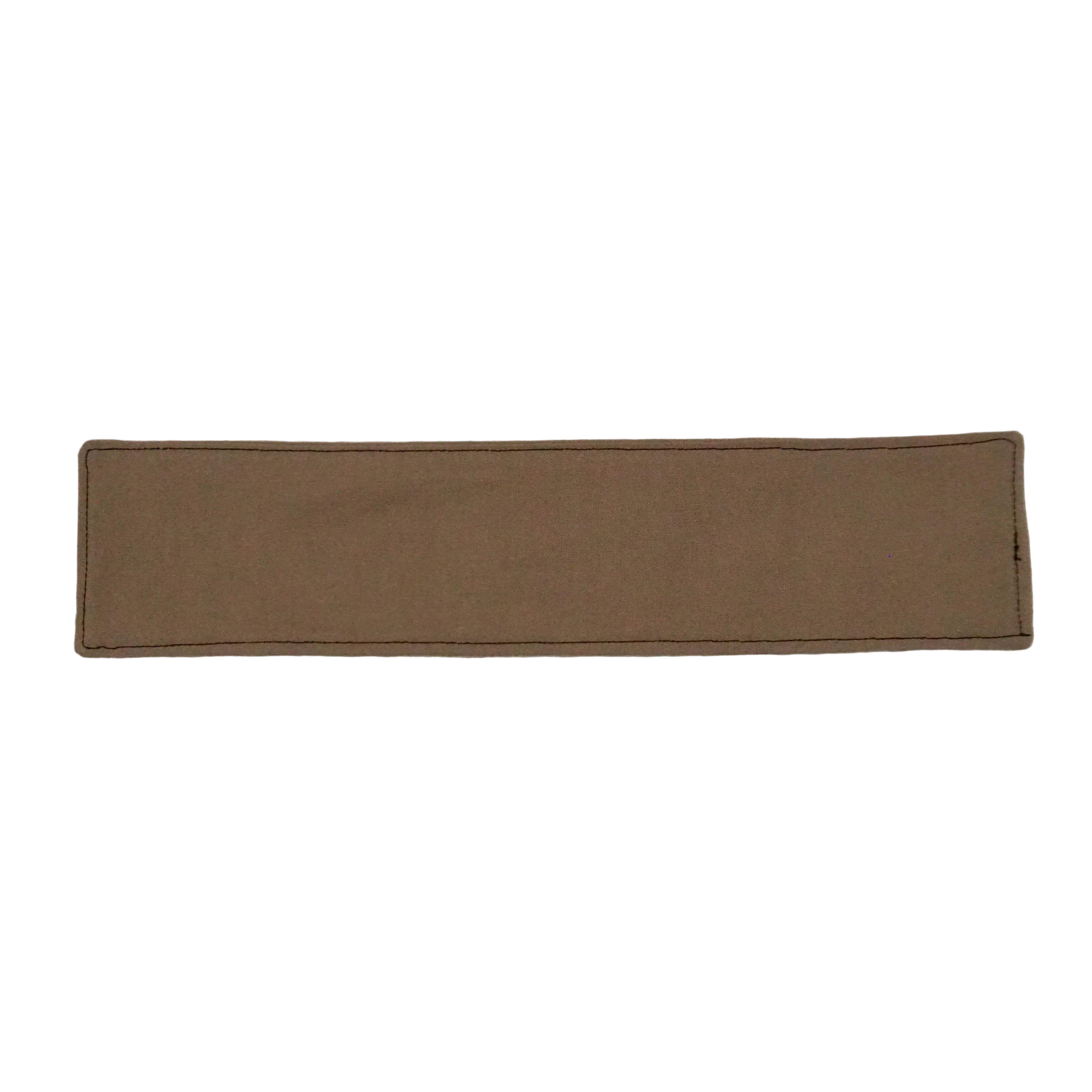 Solid beige fabric bookmark on a white background.